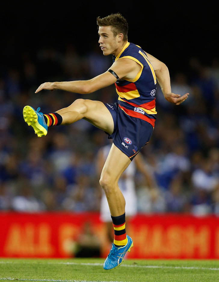AFL 2016 Rd 01 - North Melbourne v Adelaide MELBOURNE, AUSTRALIA - MARCH 26: Paul Seedsman of the Crows kicks the ball during the 2016 AFL Round 01 match between the North Melbourne Kangaroos and the Adelaide Crows at Etihad Stadium, Melbourne on March 26, 2016. (Photo by Michael Willson/AFL Media)